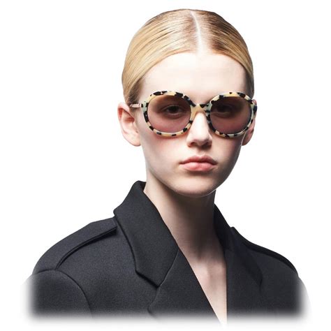 beige prada sunglasses|Prada sunglasses models.